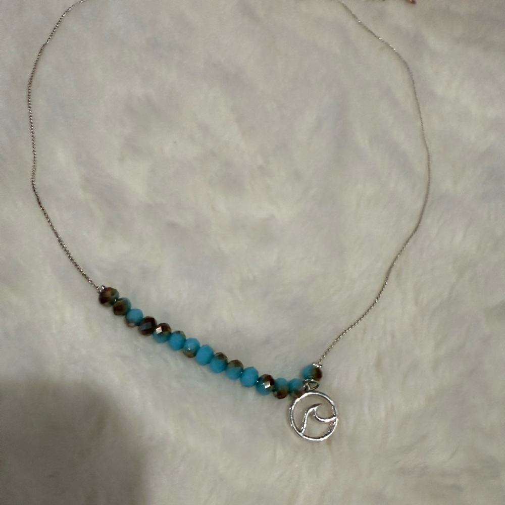 Silver and Blue Beaded Necklace with Elegant Charm